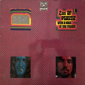 2ozs of plastic with a hole in the middle